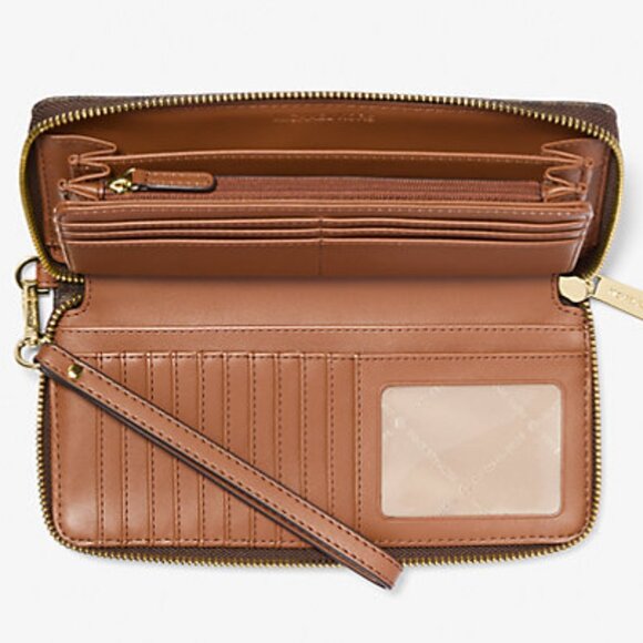 New Michael Kors Jet Set Large Travel Continental wallet PVC Brown - Picture 2 of 4